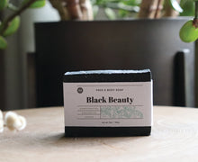 Load image into Gallery viewer, Black Beauty 5 oz. face and body soap bar. handcrafted, unscented, vegan