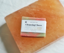 Load image into Gallery viewer, Cleansing Clover 5 oz. hand and body soap bar on a himalayan salt plate. Handcrafted, Olive Seed