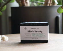 Load image into Gallery viewer, Black Beauty 5 oz. face and body soap bar. handcrafted, unscented, vegan
