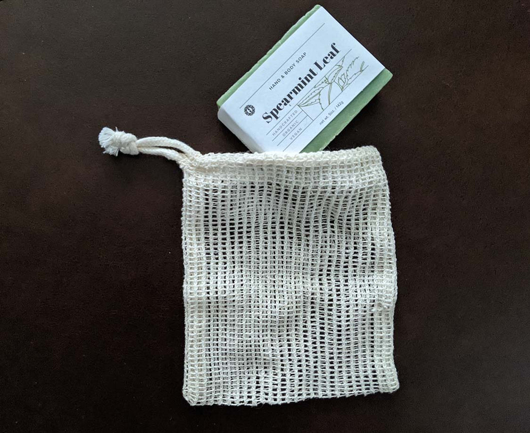 Ramie Fiber drawstring soap pouch with spearmint leaf soap bar. Olive Seed